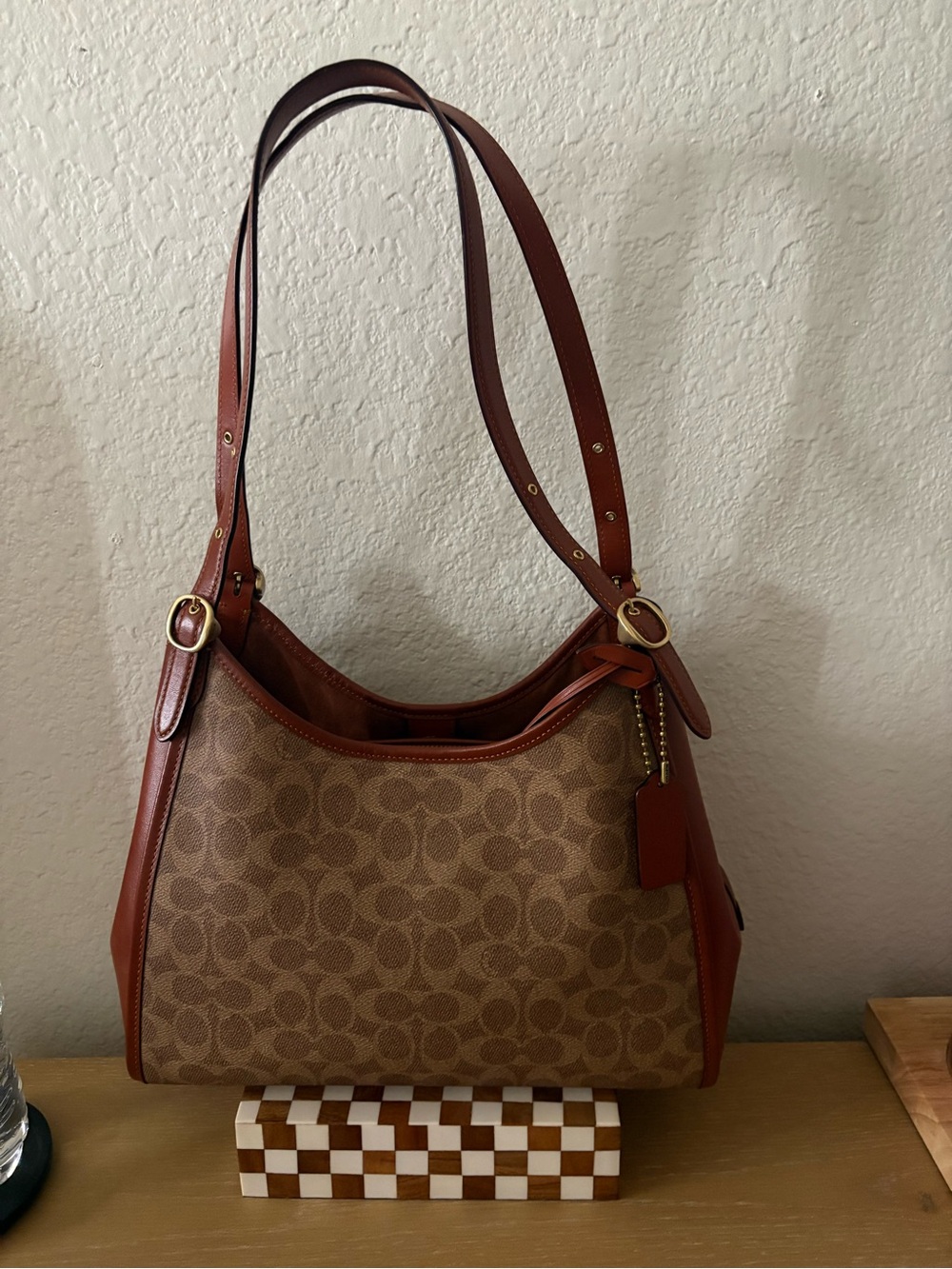 Coach Brown Signature Canvas Shoulder Bag with Rust Trim